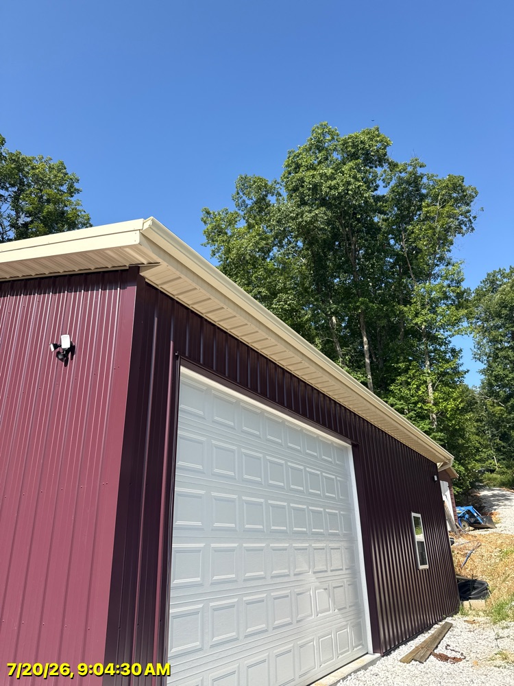 Seamless gutter run on a Northwest Arkansas roofline
