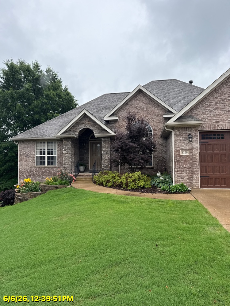 Seamless gutter run on a Northwest Arkansas roofline