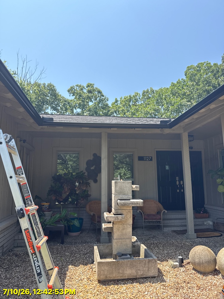 The Brothers That Just Do Gutters truck on a Northwest Arkansas job