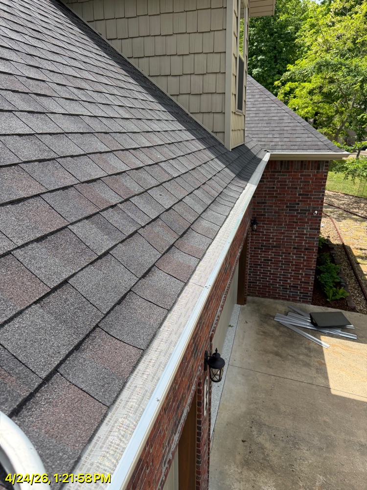 Brothers Gutters Solutionist at work on a Northwest Arkansas home