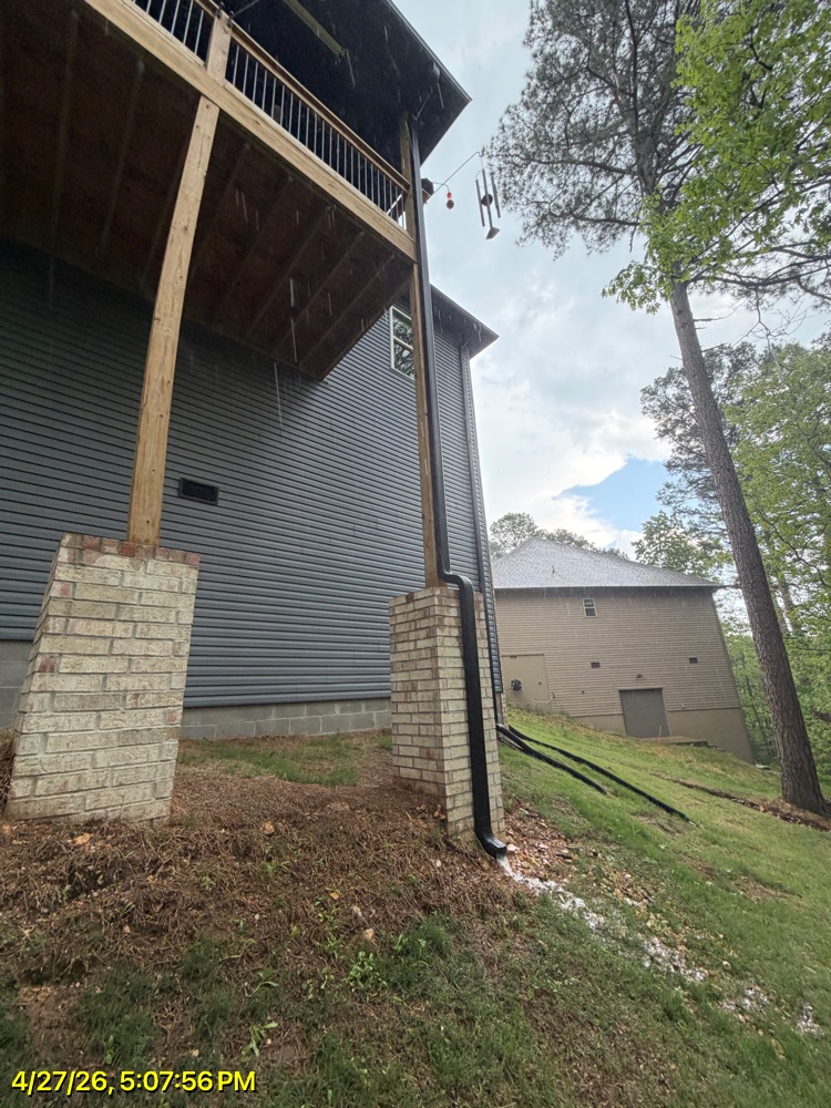 Brothers Gutters Solutionist at work on a Northwest Arkansas home