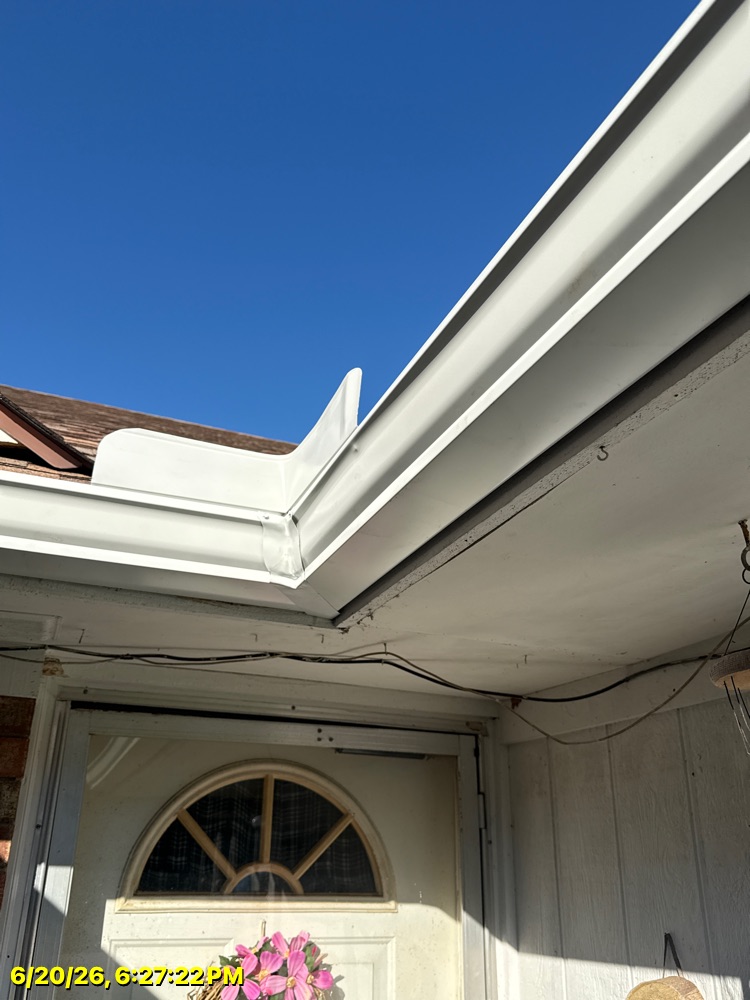 The Brothers That Just Do Gutters truck on a Northwest Arkansas job
