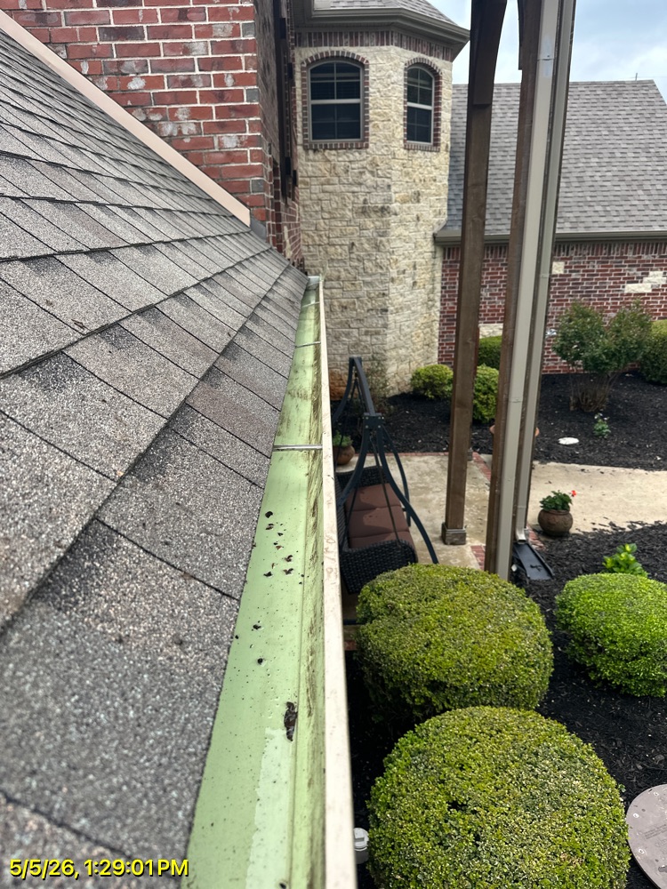 The Brothers That Just Do Gutters truck on a Northwest Arkansas job