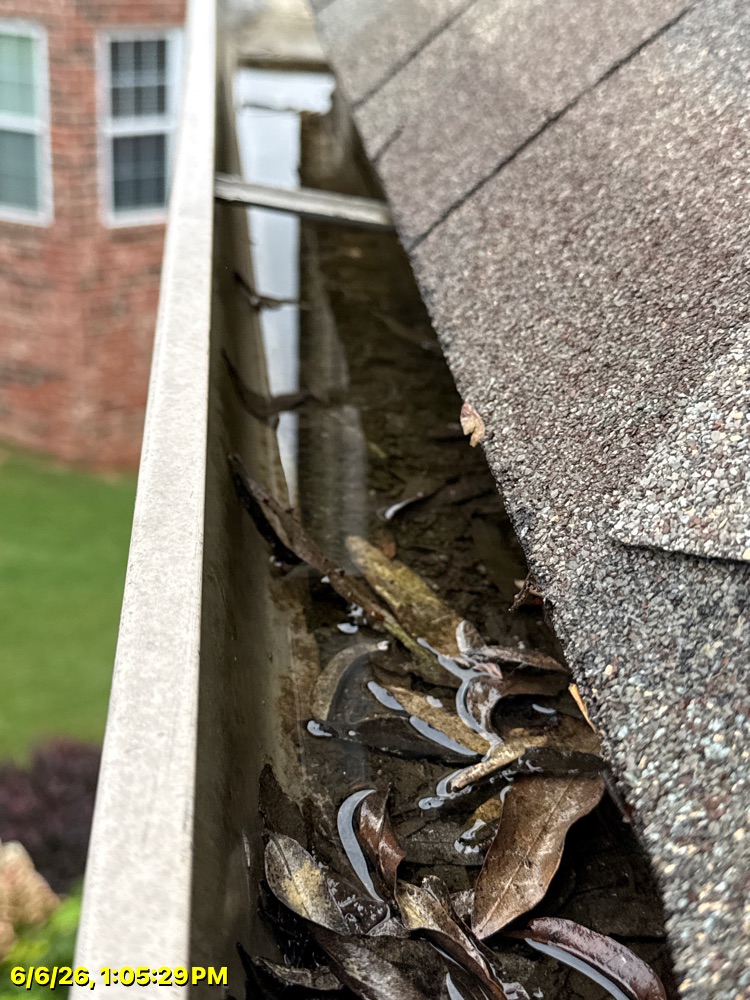 Seamless gutter run on a Northwest Arkansas roofline