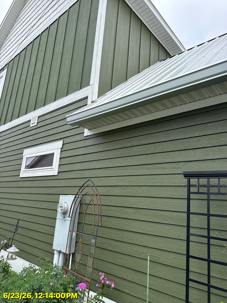 Brothers Gutters Solutionist at work on a Northwest Arkansas home