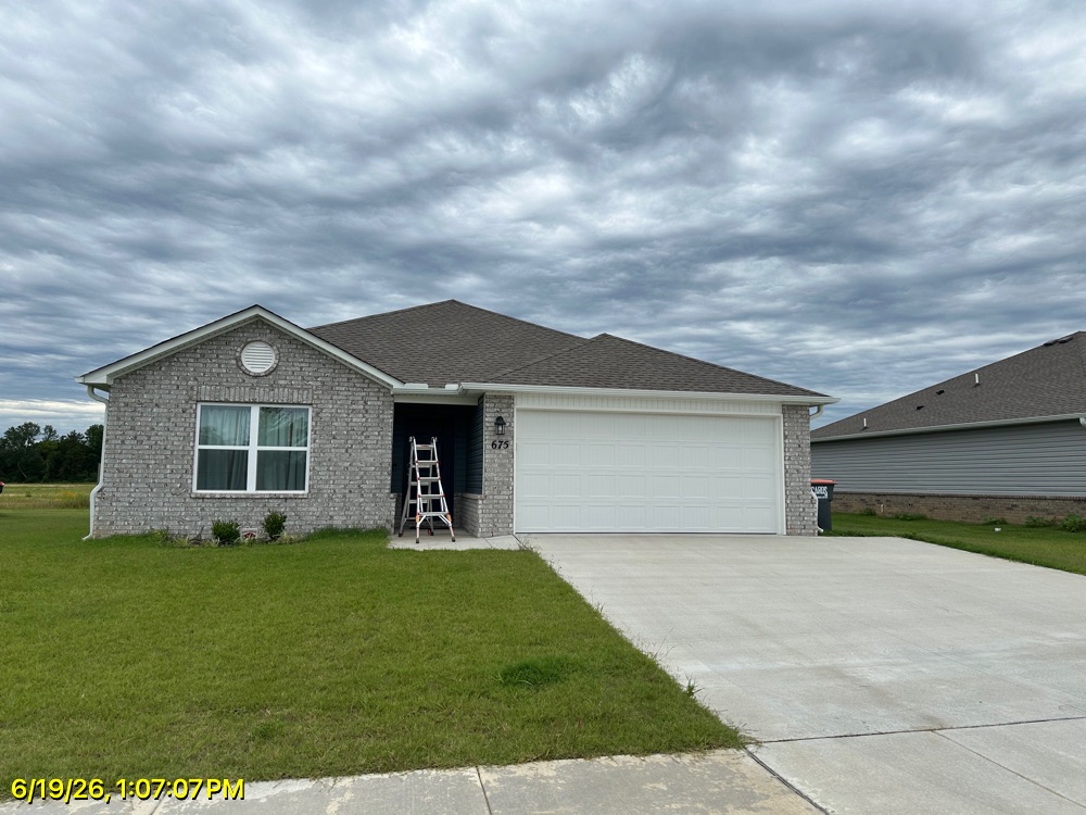 Seamless gutter run on a Northwest Arkansas roofline