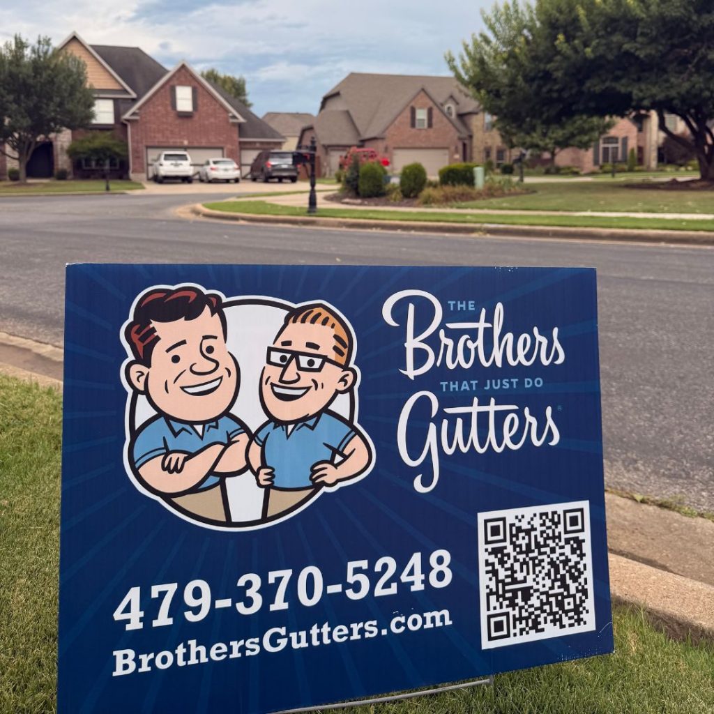 Brothers Gutters Solutionist at work on a Northwest Arkansas home