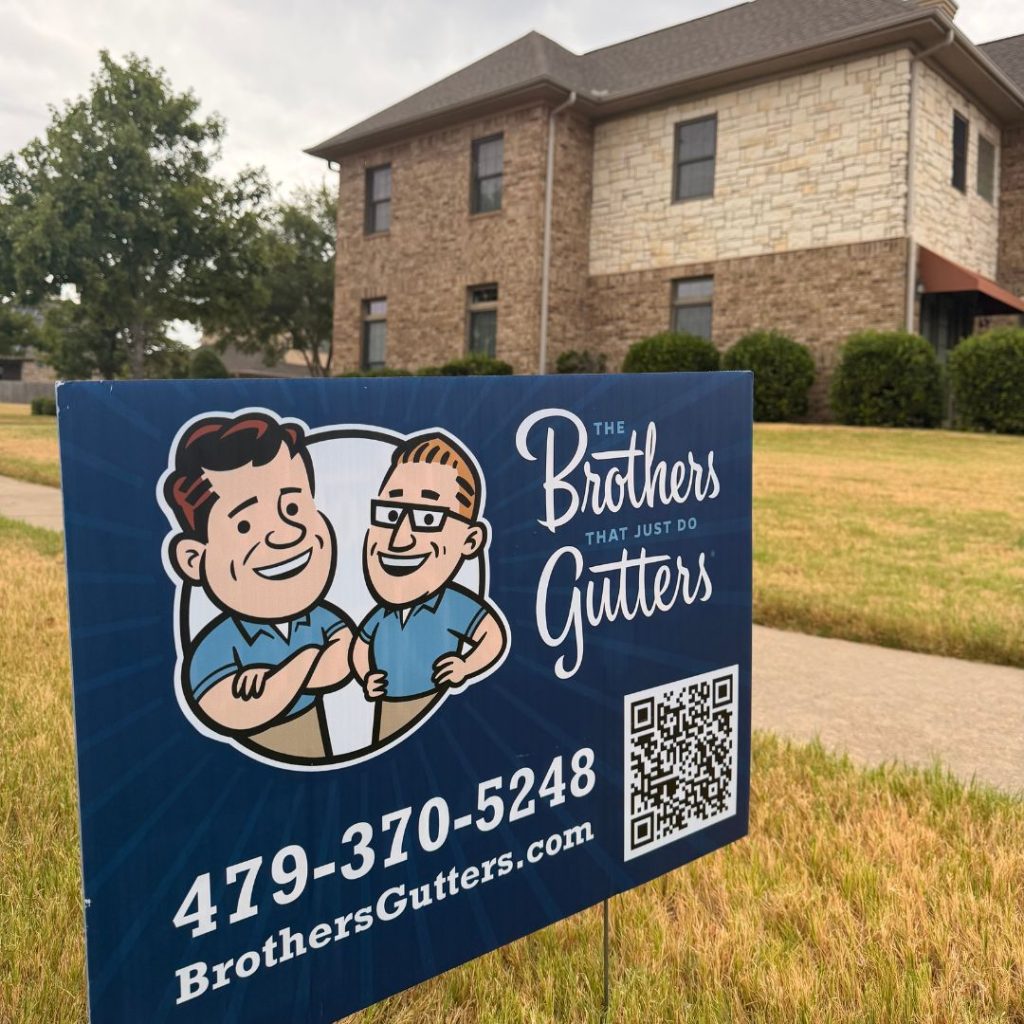 Brothers Gutters Solutionist at work on a Northwest Arkansas home