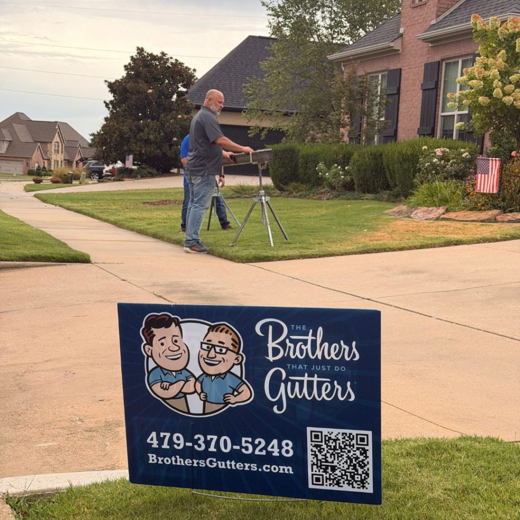 The Brothers That Just Do Gutters truck on a Northwest Arkansas job