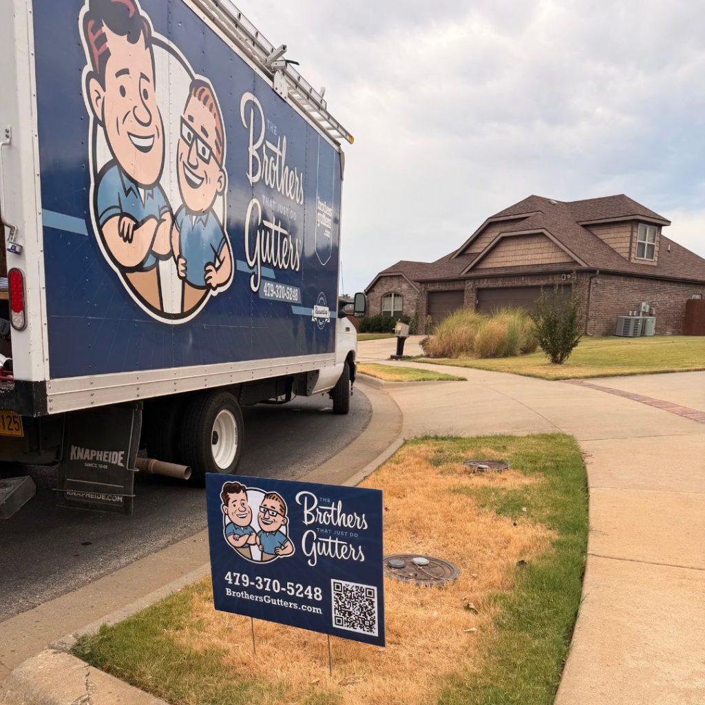 Brothers Gutters Solutionist at work on a Northwest Arkansas home