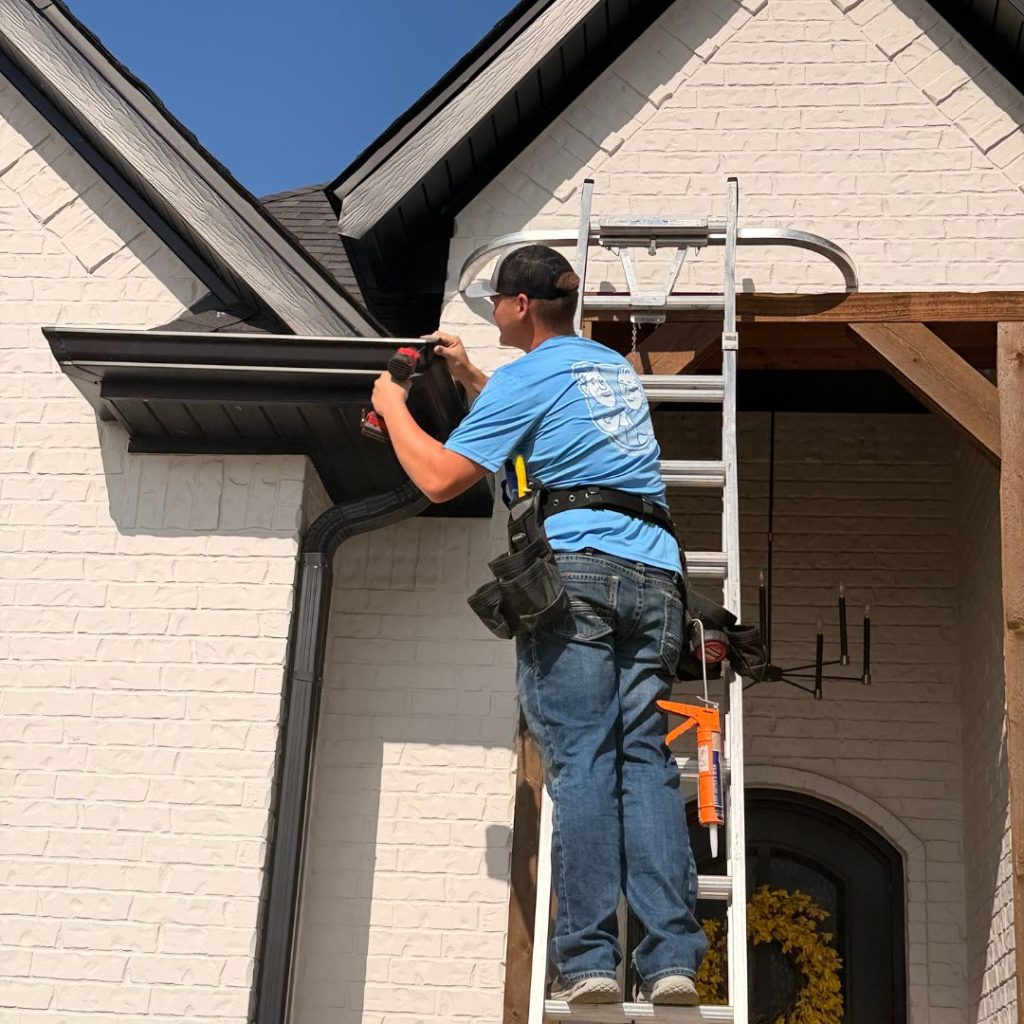 The Brothers That Just Do Gutters truck on a Northwest Arkansas job